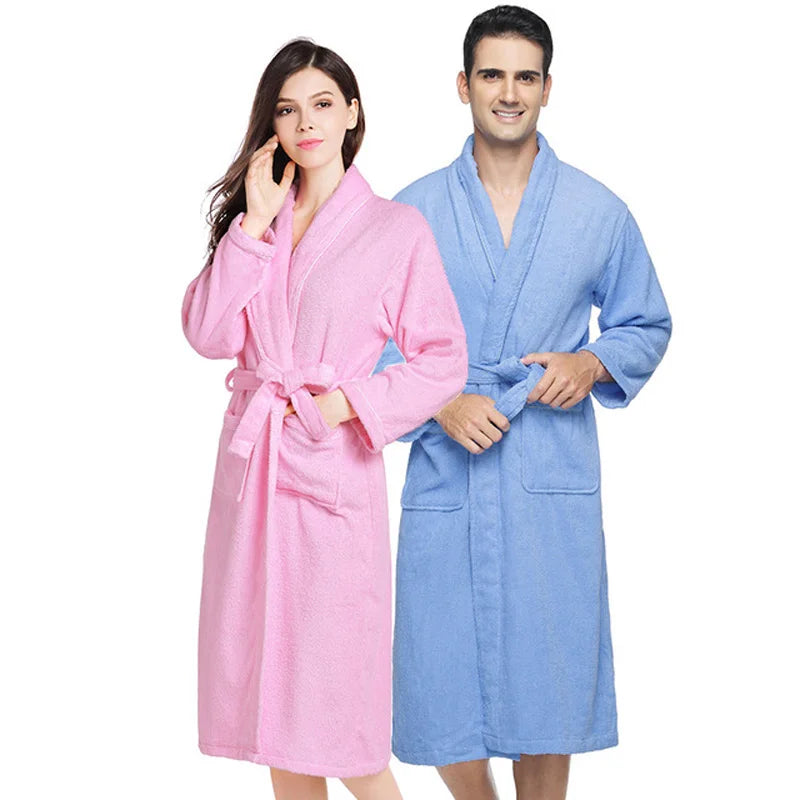 Two people wearing pink and blue robes on a white background