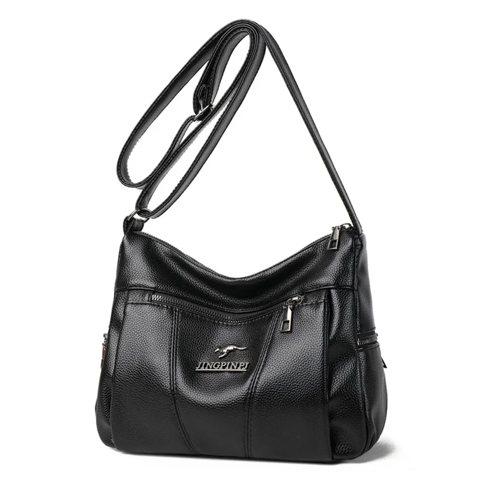 Black handbag with a visible brand logo on a white background