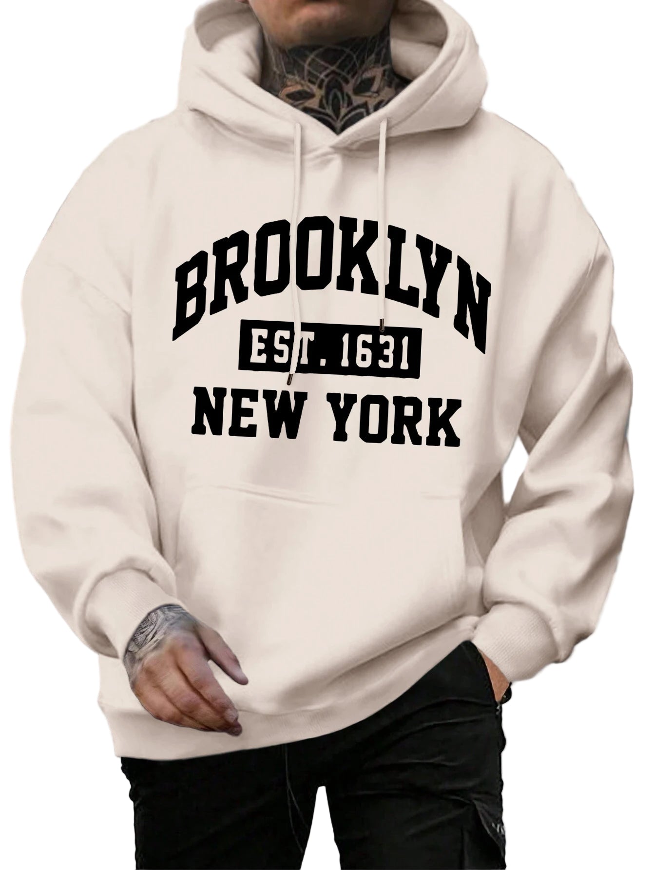Person wearing a white hoodie with 'Brooklyn Est. 1631 New York' text.