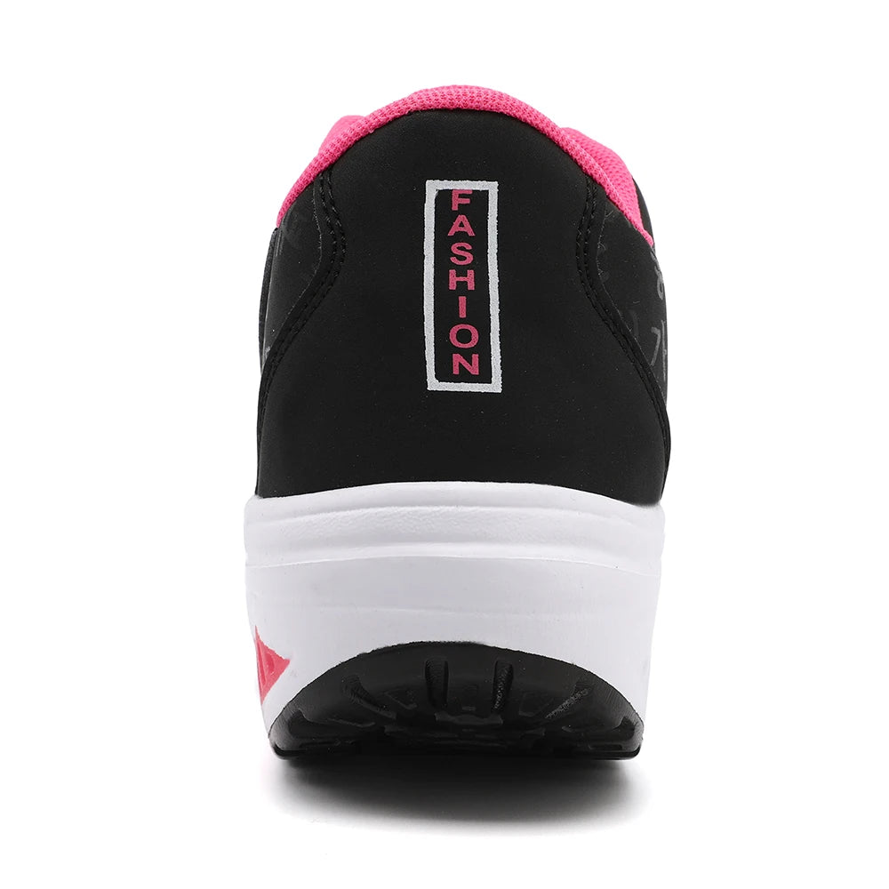 Black and pink sneaker with 'Fashion' label on a white background