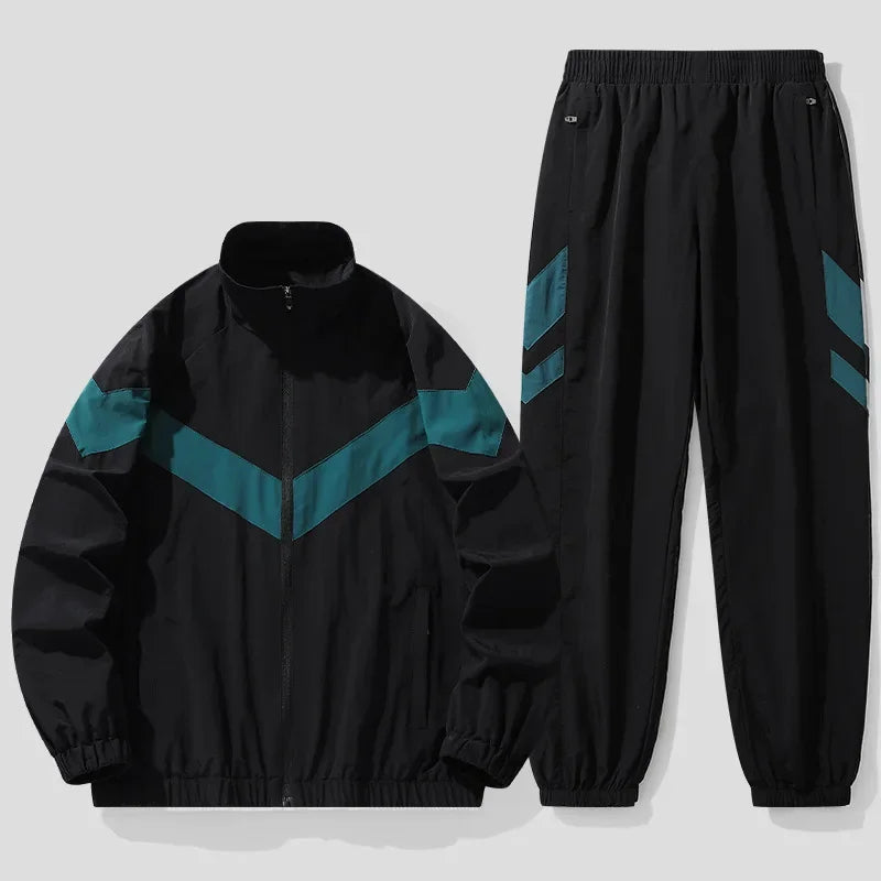 Black tracksuit with teal stripes on a light gray background