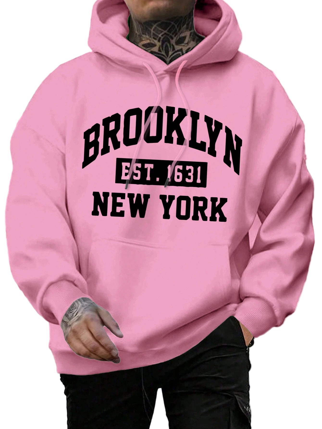 Person wearing a pink hoodie with 'Brooklyn Est. 1631 New York' text.