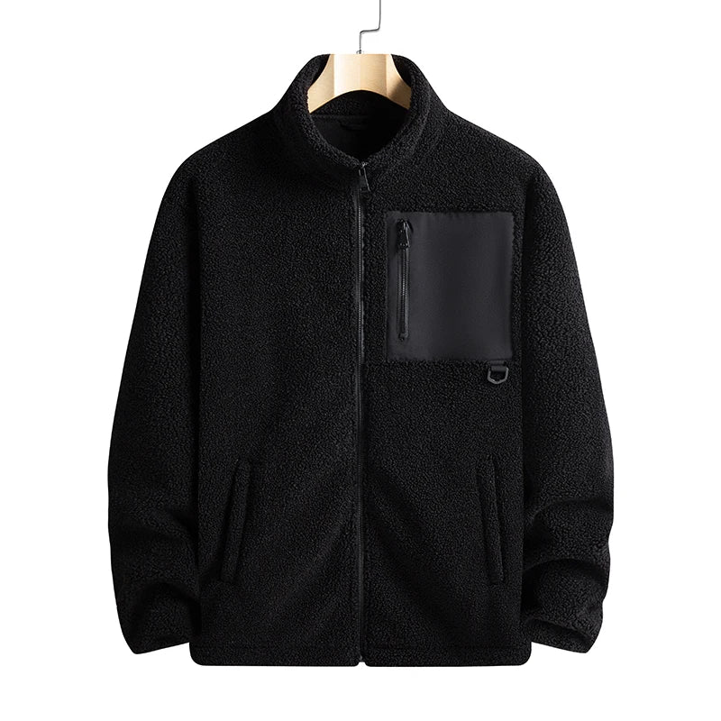 Black fleece jacket with a pocket on a hanger against a white background