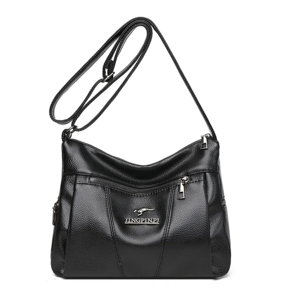 Black handbag with a visible brand logo on a white background