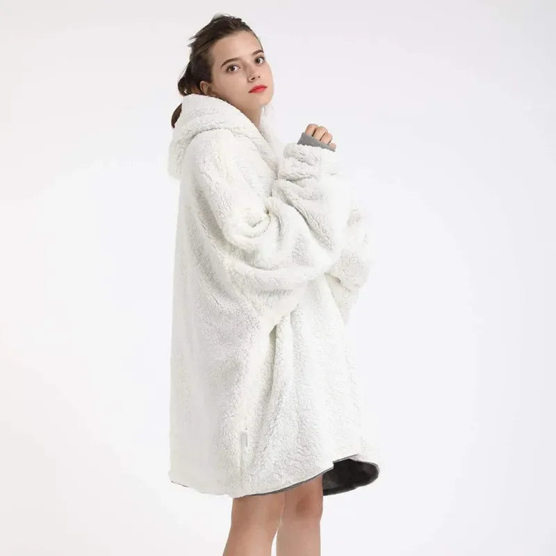 Woman wearing a white fluffy coat on a white background