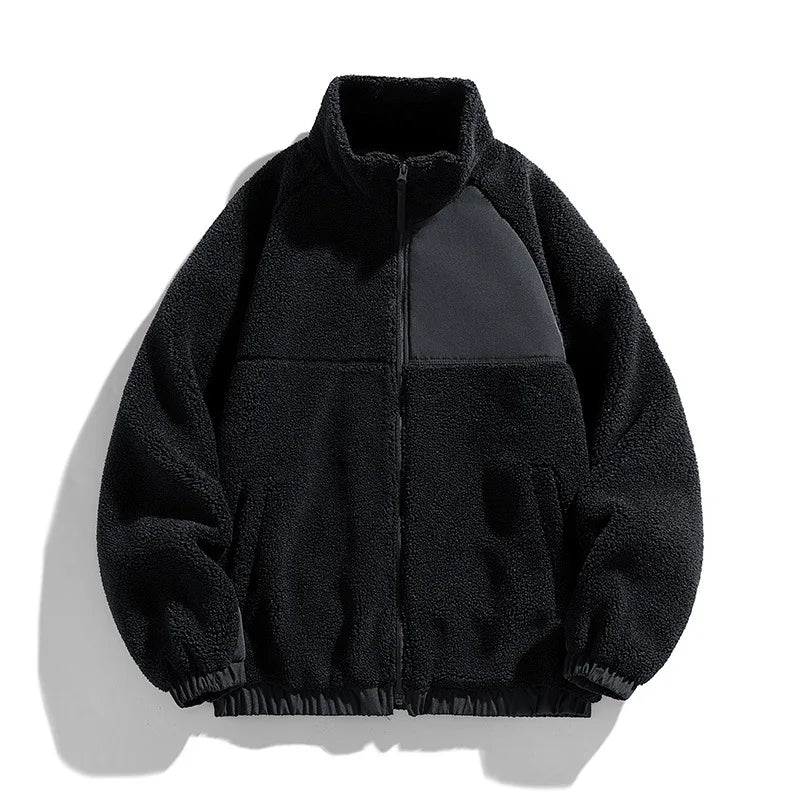 Black fleece jacket with a high collar on a white background