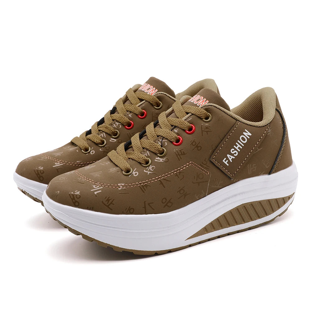 Brown fashion sneakers with white soles on a white background