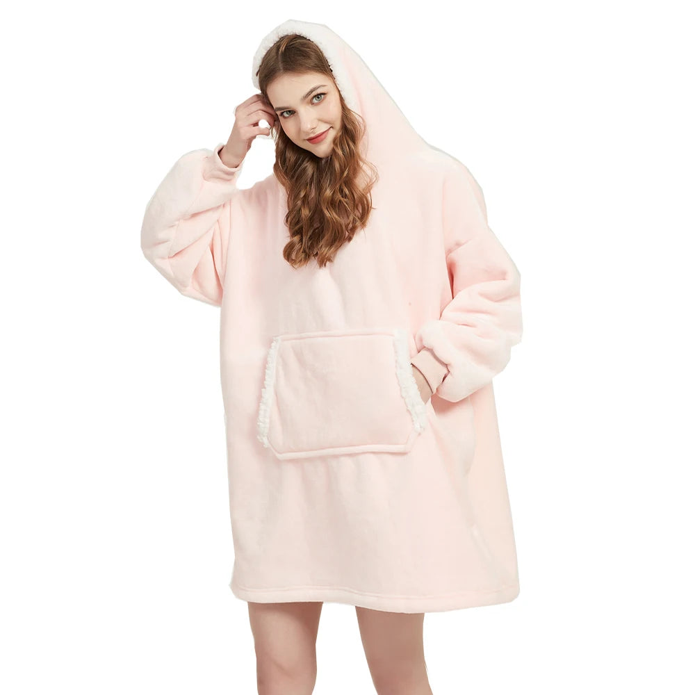Person wearing a light pink hoodie with a white background