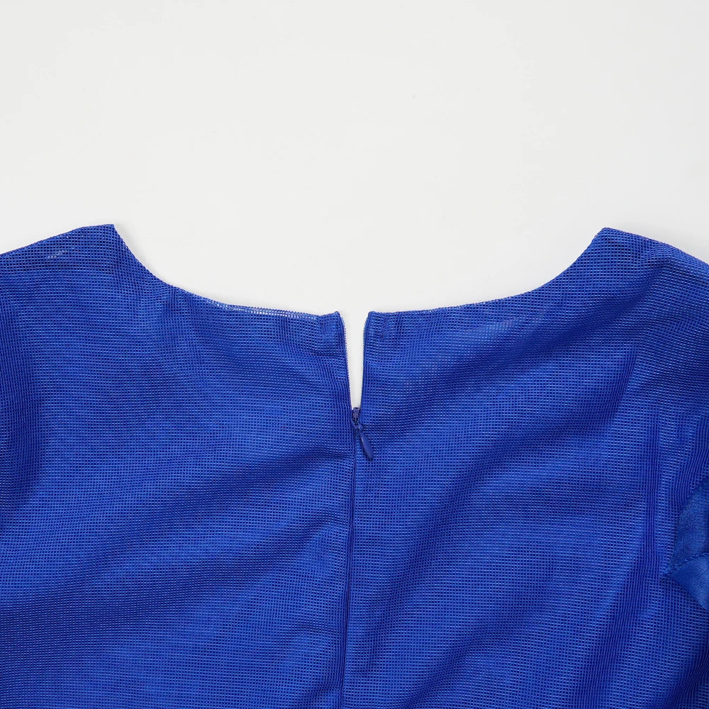Close-up of a blue fabric garment on a white background