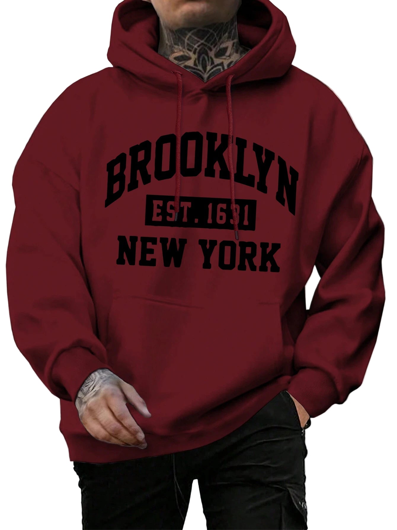 Red hoodie with 'Brooklyn Est. 1651 New York' text worn by a person on a street.