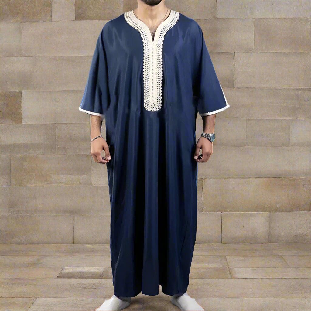 Navy blue robe with white embroidery on a gray background