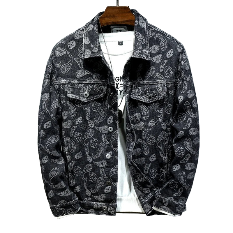 Black paisley patterned jacket on a gray background