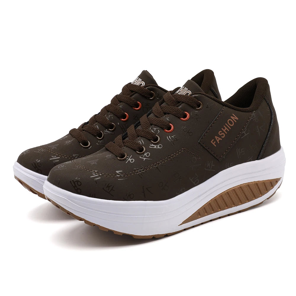 Brown fashion sneakers with white soles on a white background