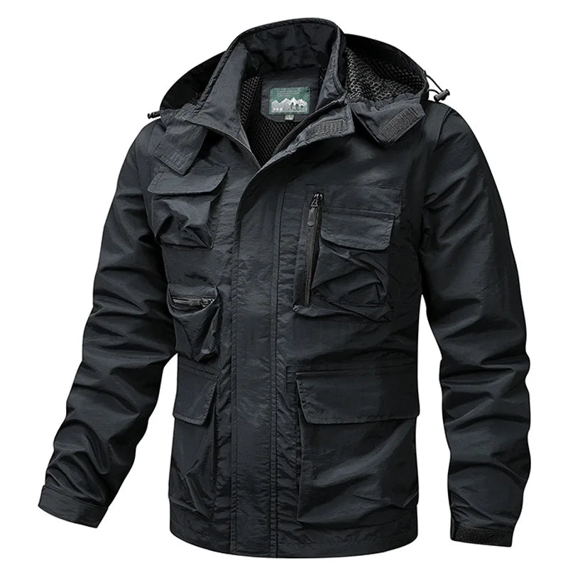 Black jacket with multiple pockets and a hood on a white background