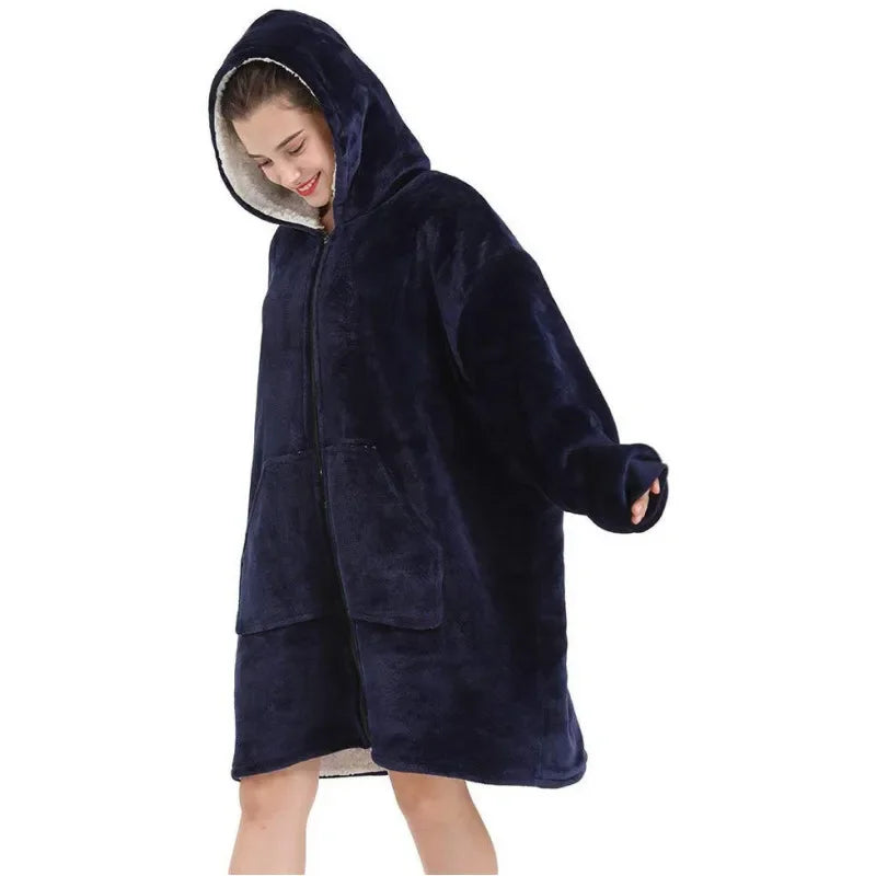 Person wearing a dark blue hooded robe on a white background