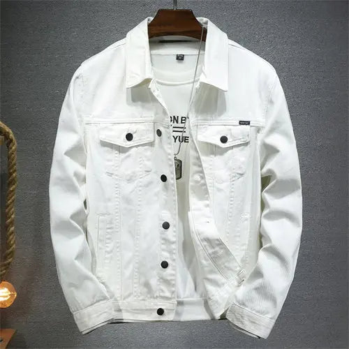 White denim jacket on a hanger against a gray background