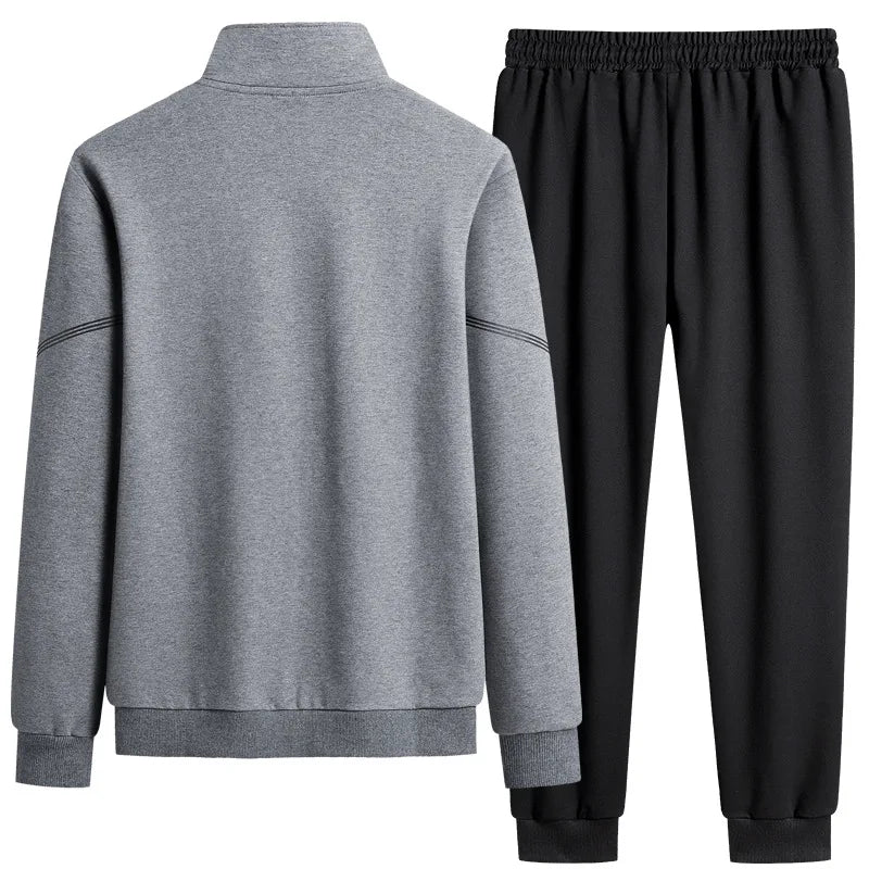 Gray tracksuit with black pants on a white background