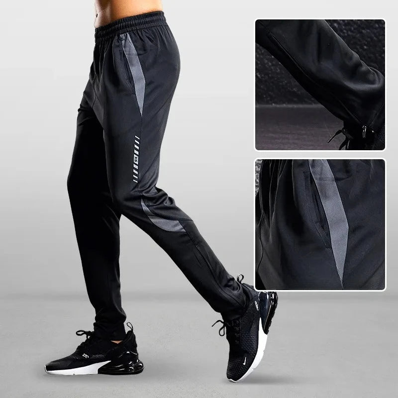 Black athletic pants with gray accents worn by a person on a gray background, with close-up insets showing texture and design details.