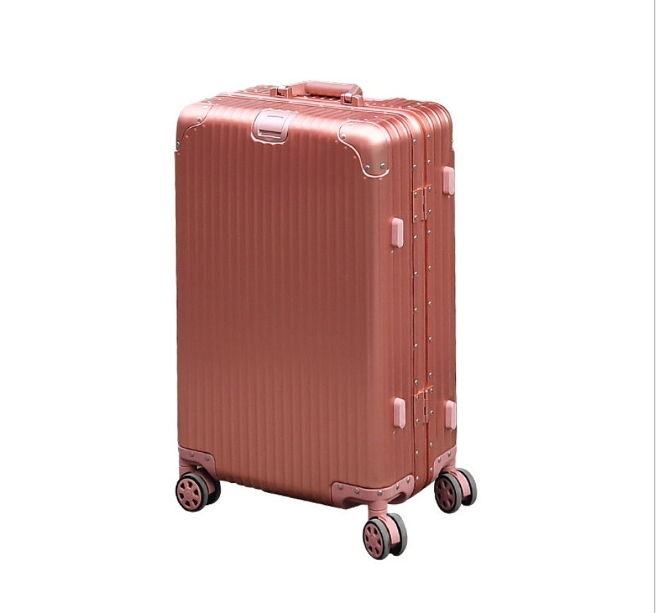 Rose gold suitcase with wheels on a white background